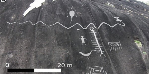 Rock face with engravings depicting animals such as giant snakes